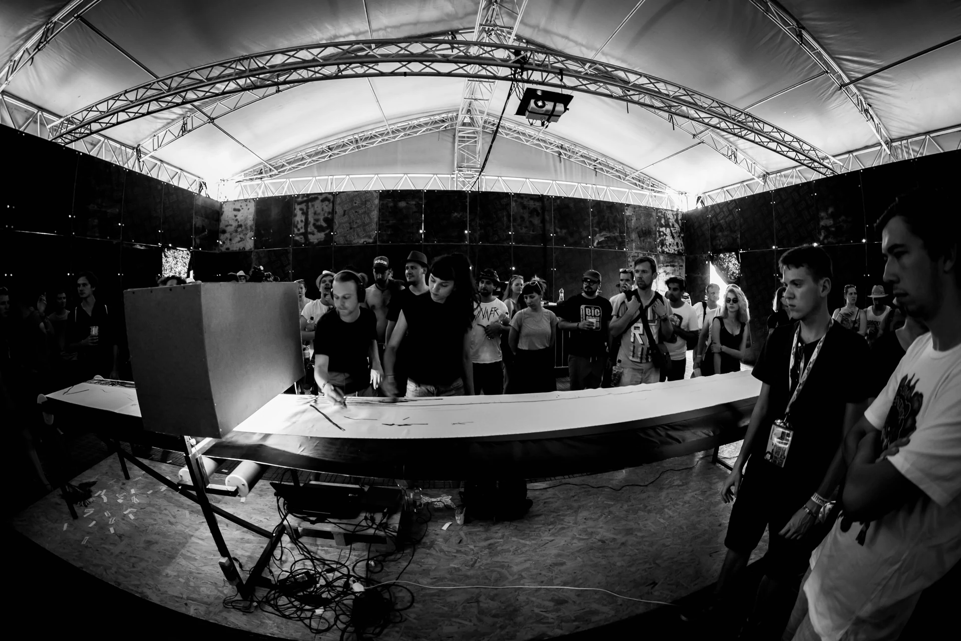 Boris Vitázek and Zuzana Sabová performing with Grafofon at Pohoda Festival, surrounded by an audience
