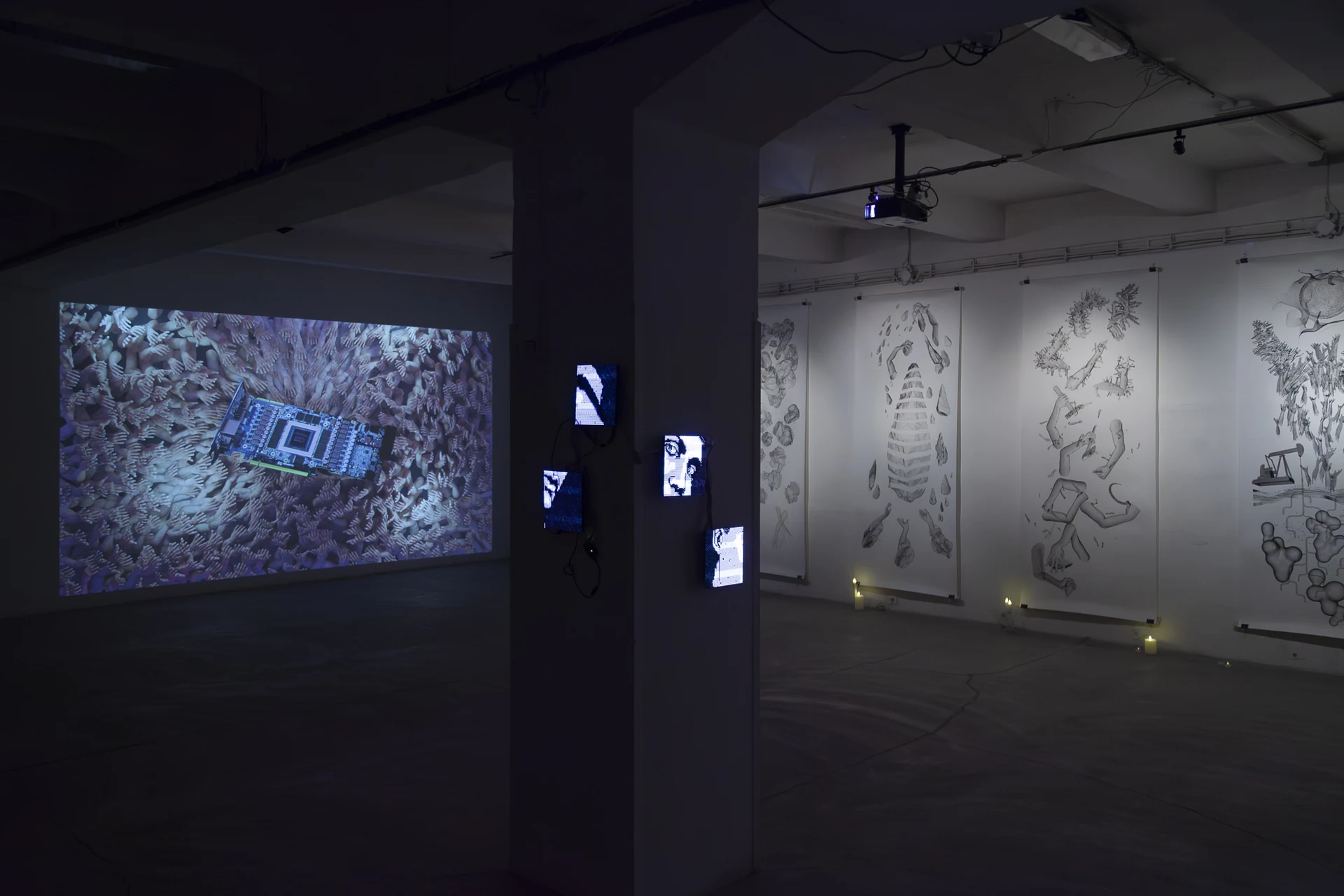 Infinite Countdown installed in a gallery, with LED screens and drawings