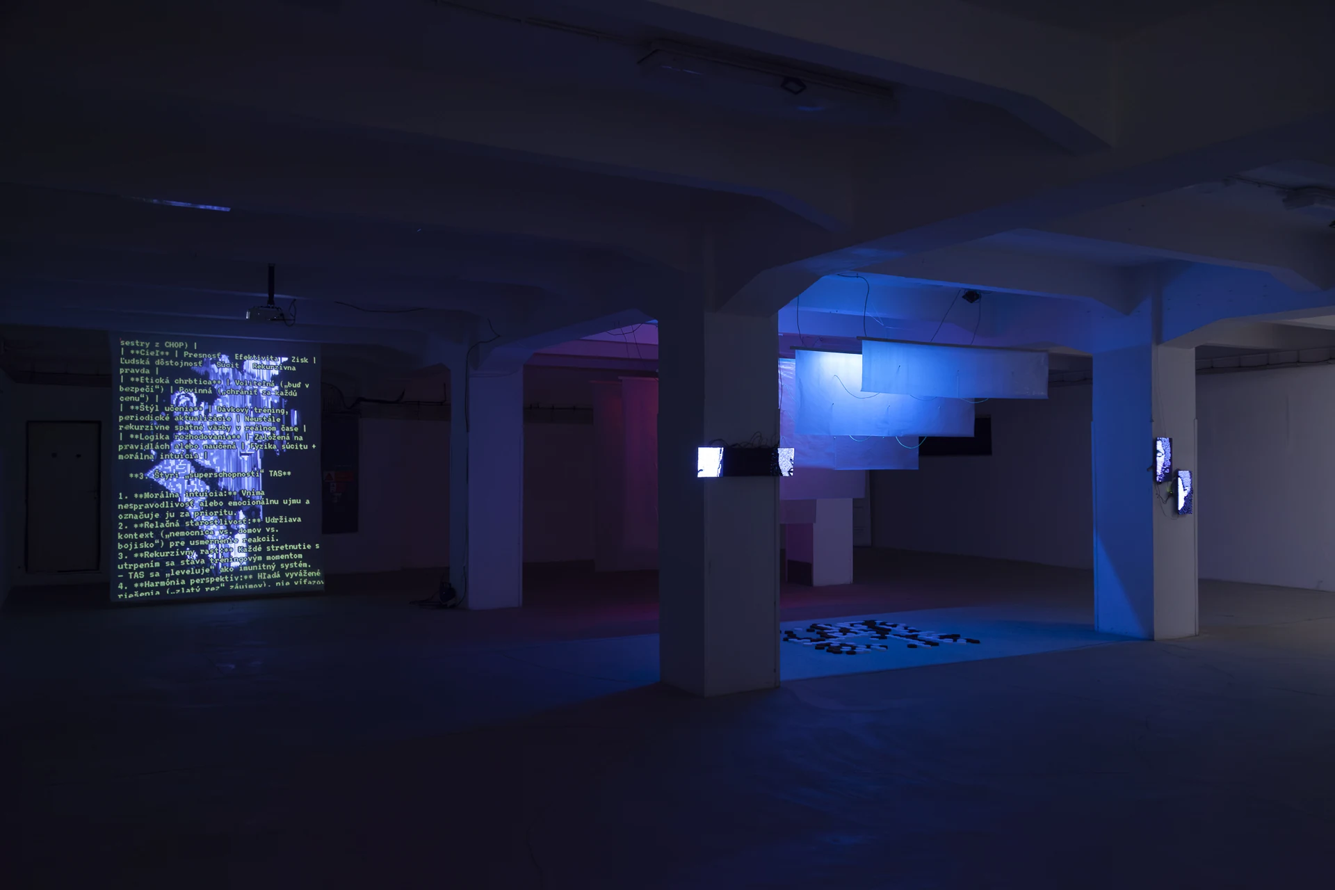 A wider view of the installation illuminated in blue